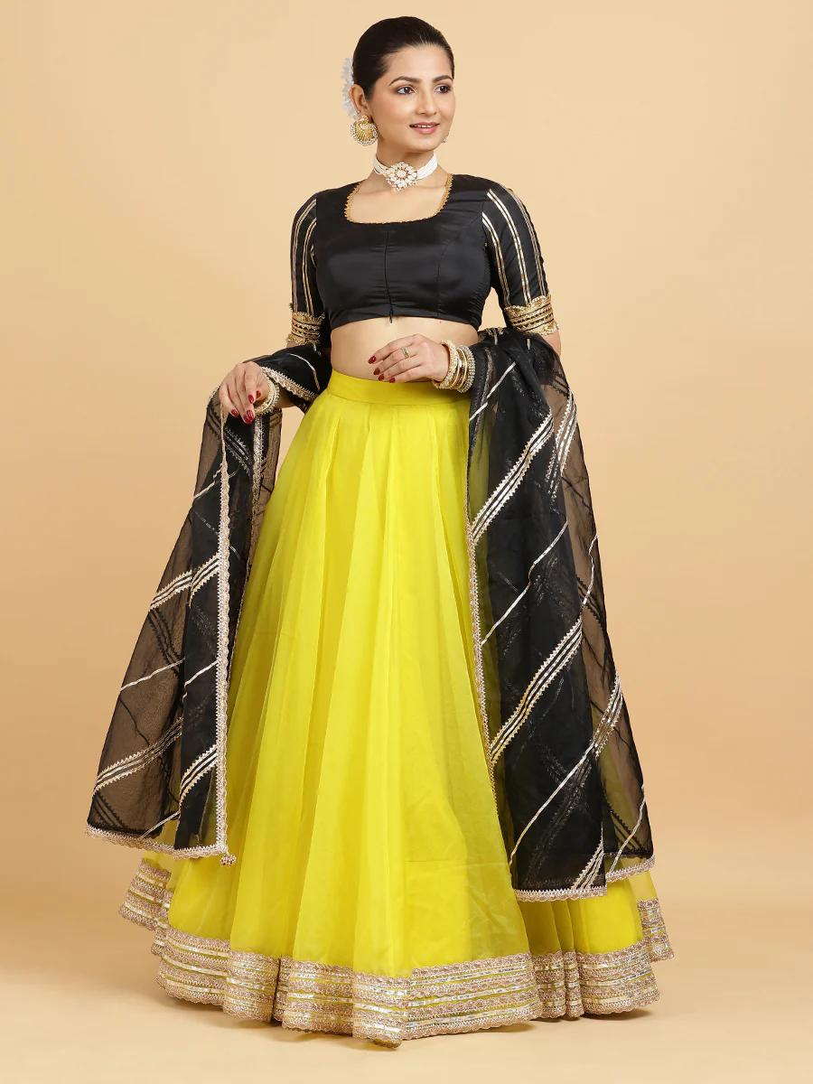 Farah Aziza 4-Pc Lehenga Set x Tyohaar | Lemon Yellow Lehenga, Charcoal Black Blouse with Chandni Black Dupatta and Cancan Skirt - Image 4