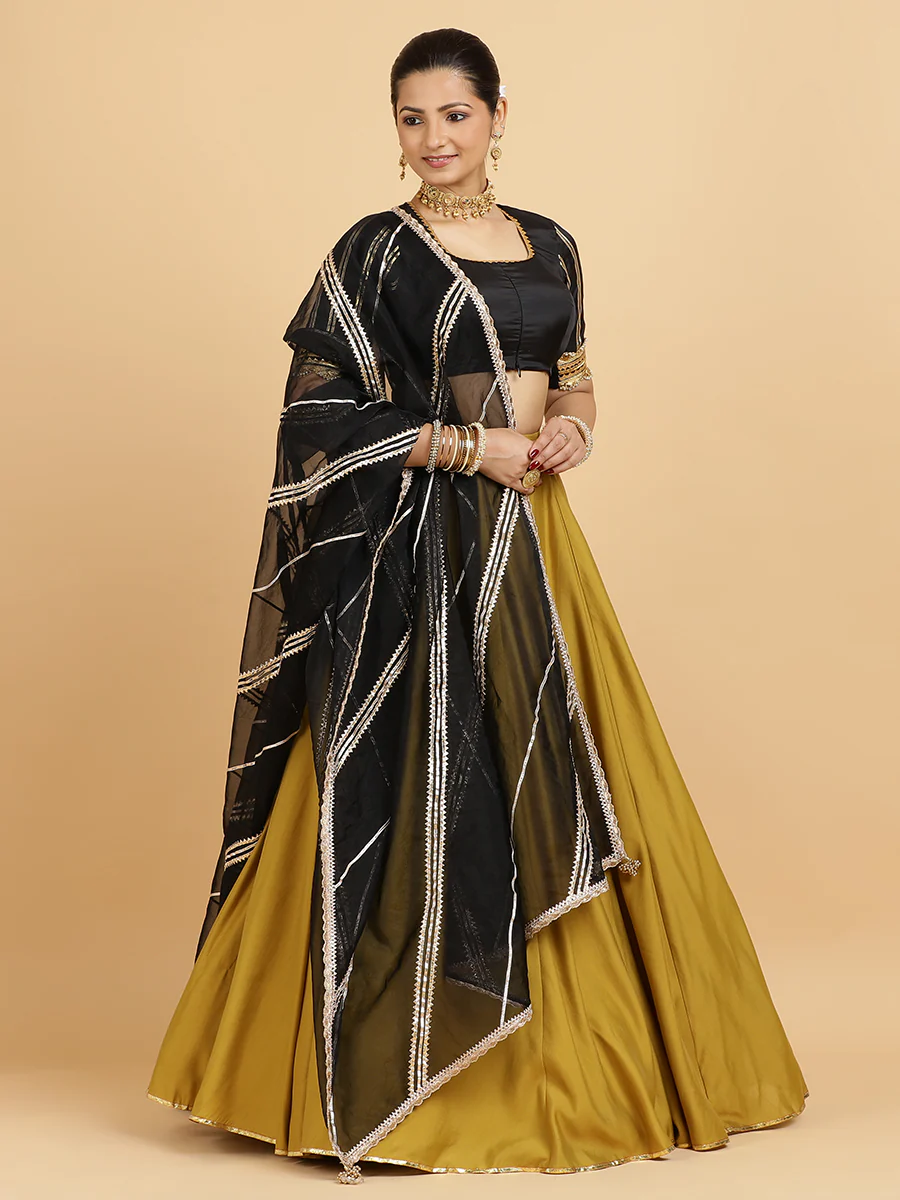 Jhalak Aziza 4-Pc Lehenga Set x Tyohaar | Mustard Lehenga, Charcoal Black Blouse with Chandni Black Dupatta and Cancan Skirt - Image 6
