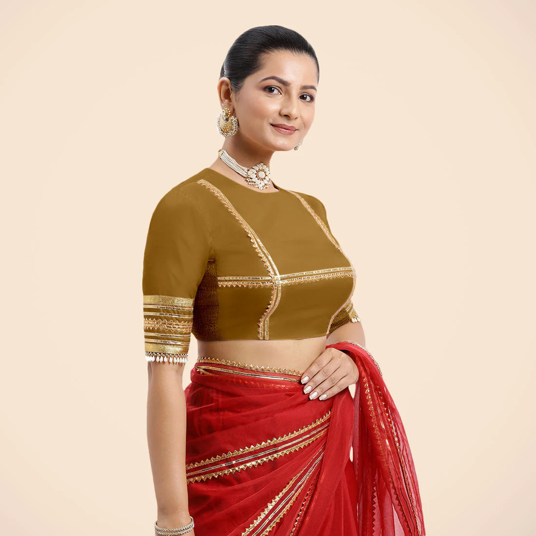 Farheen x Tyohaar | Bronze Gold Embellished Elbow Sleeves FlexiFit™ Saree Blouse with Zero Neck with Back Cut-Out and Golden Gota Embellishment - Image 2