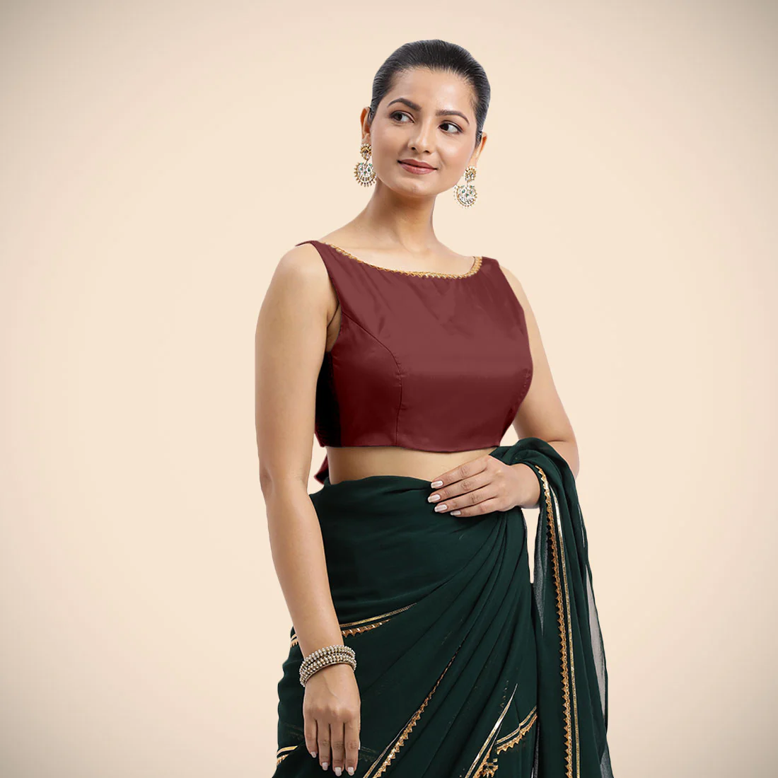 Sherry x Tyohaar | Burgundy Sleeveless FlexiFit™ Saree Blouse with Simple Golden Gota Lace on Neckline and Removable Bow on Back - Image 5