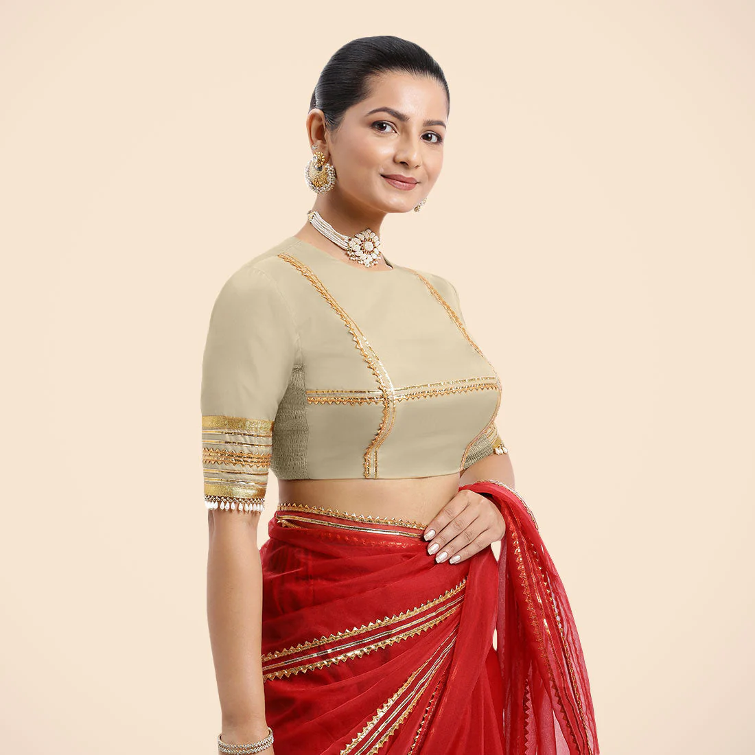 Farheen x Tyohaar | Cream Embellished Elbow Sleeves FlexiFit™ Saree Blouse with Zero Neck with Back Cut-Out and Golden Gota Embellishment - Image 2