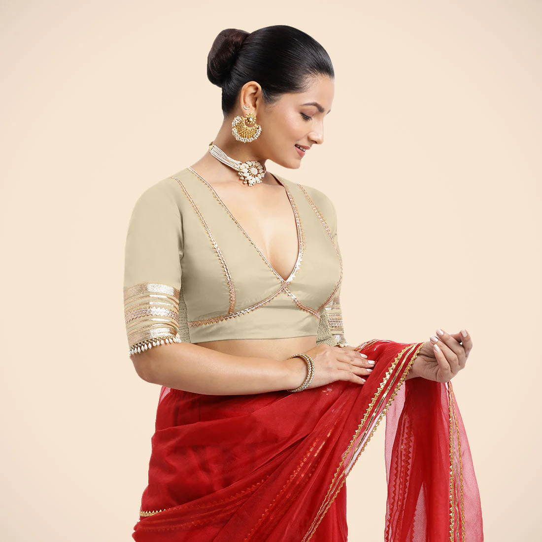 Nafeeza x Tyohaar | Cream Embellished Elbow Sleeves FlexiFit™ Saree Blouse with Plunging V Neckline with Tasteful Golden Gota Lace - Image 14