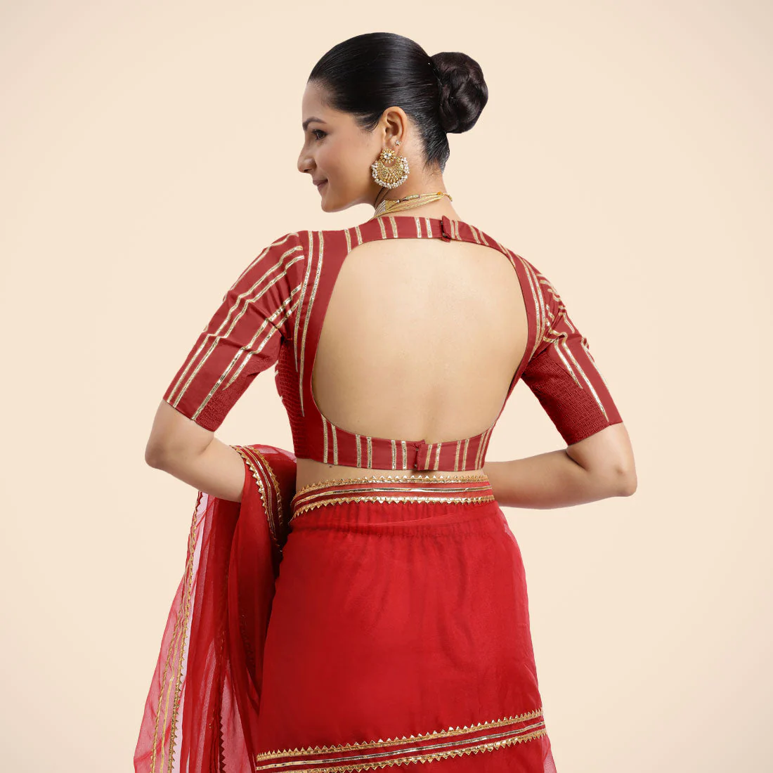 Shaheen x Tyohaar | Crimson Red Elbow Sleeves FlexiFit™ Saree Blouse with Zero Neck with Back Cut-Out and Golden Gota Embellishment - Image 7