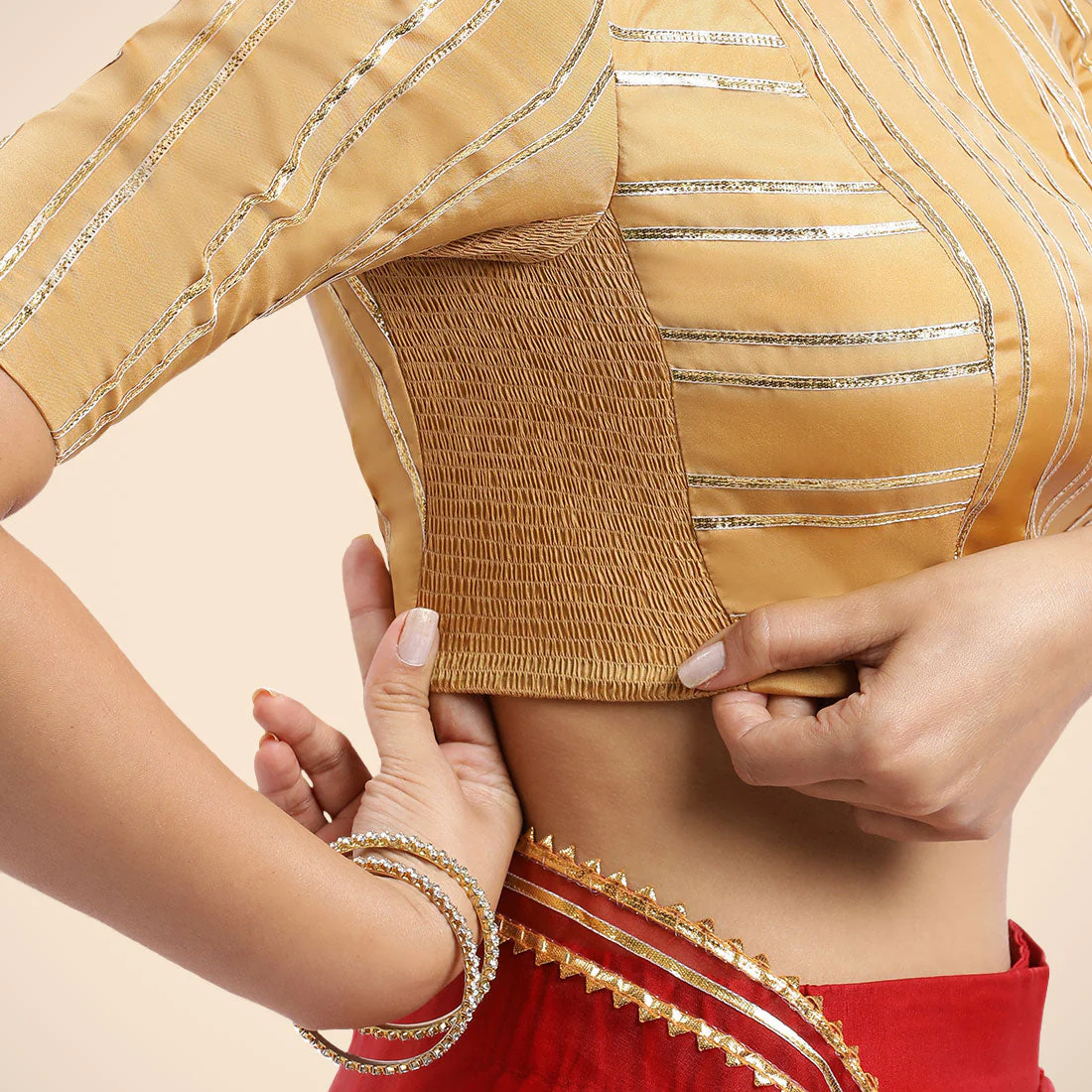 Shaheen x Tyohaar | Gold Elbow Sleeves FlexiFit™ Saree Blouse with Zero Neck with Back Cut-Out and Golden Gota Embellishment - Image 11
