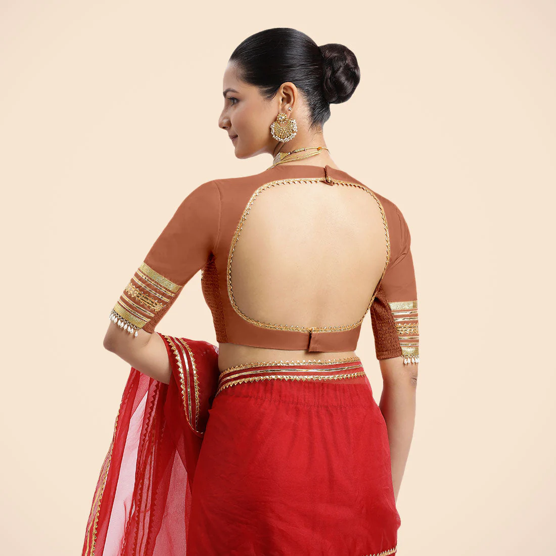Farheen x Tyohaar | Metallic Copper Embellished Elbow Sleeves FlexiFit™ Saree Blouse with Zero Neck with Back Cut-Out and Golden Gota Embellishment - Image 2