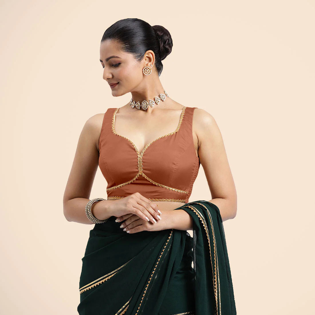 Ishika x Tyohaar | Metallic Copper Sleeveless FlexiFit™ Saree Blouse with Beetle Leaf Neckline with Golden Gota Lace and Back Cut-out with Tie-Up - Image 2