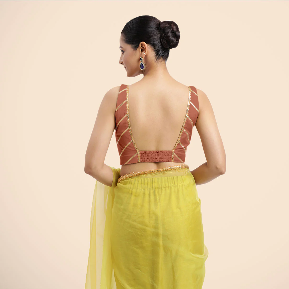 Zeba x Tyohaar | Metallic Copper Sleeveless FlexiFit™ Saree Blouse with Square Neck with Golden Gota Lace and Deep Back - Image 2