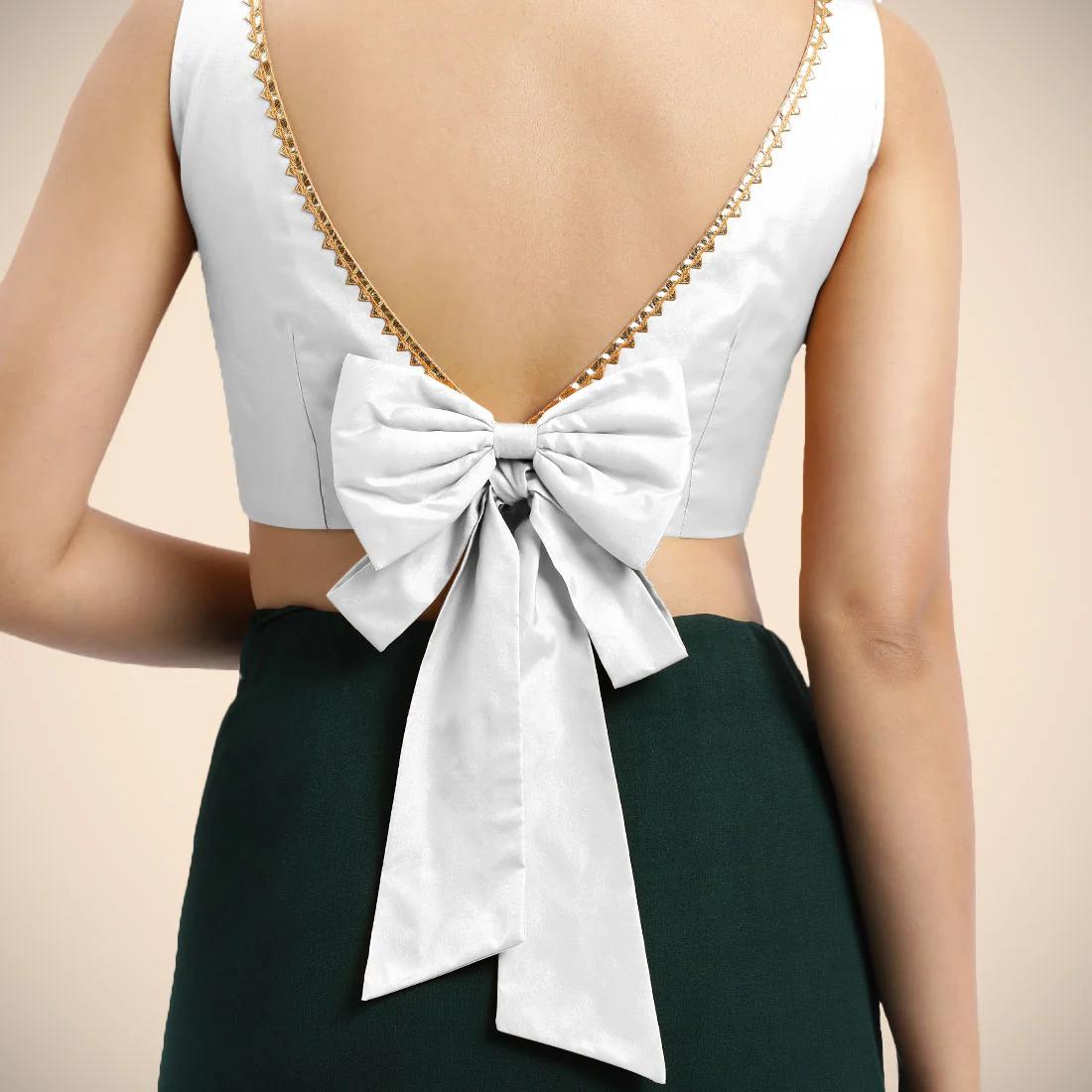 Sherry x Tyohaar | Pearl White Sleeveless FlexiFit™ Saree Blouse with Simple Golden Gota Lace on Neckline and Removable Bow on Back - Image 2