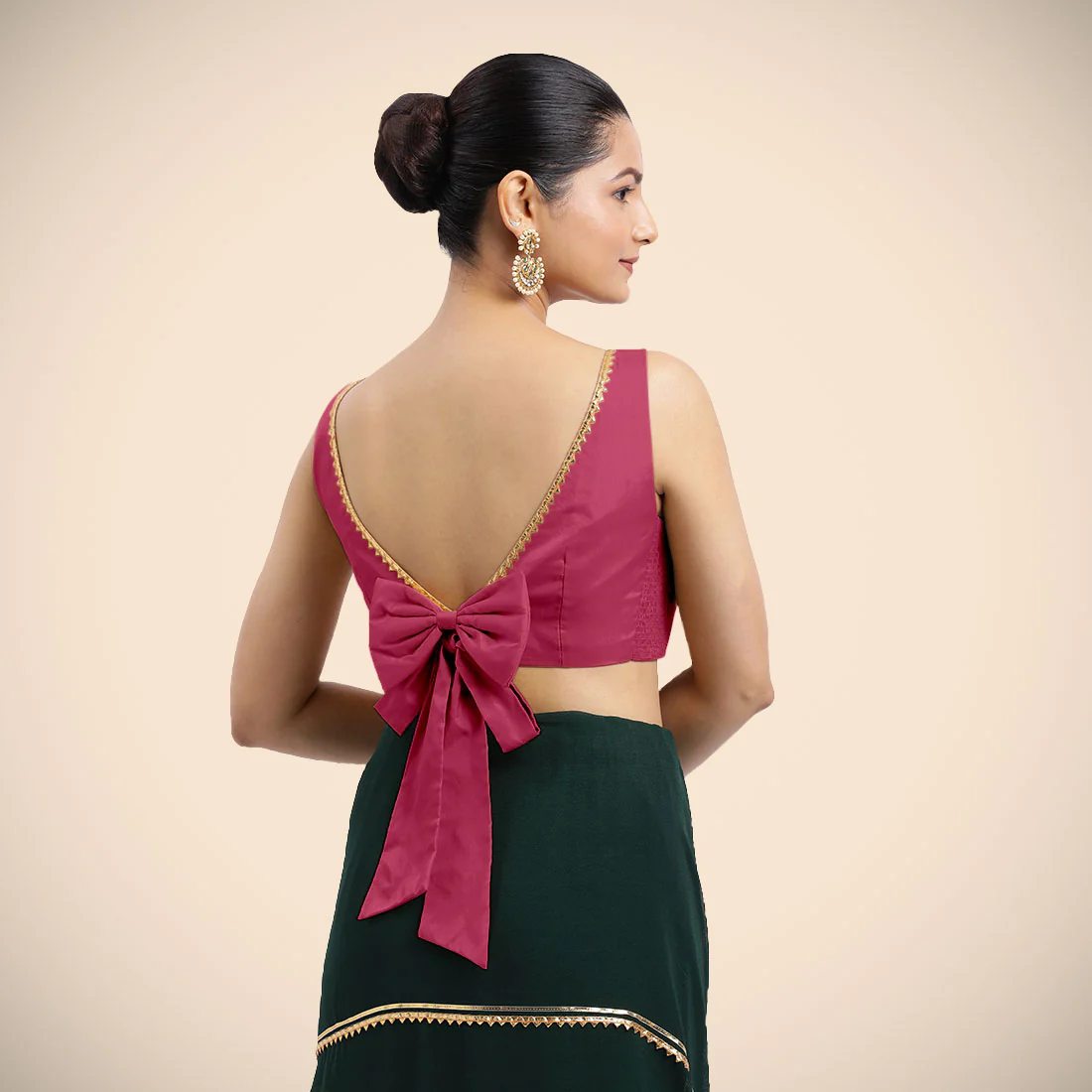 Sherry x Tyohaar | Rani Pink Sleeveless FlexiFit™ Saree Blouse with Simple Golden Gota Lace on Neckline and Removable Bow on Back - Image 2