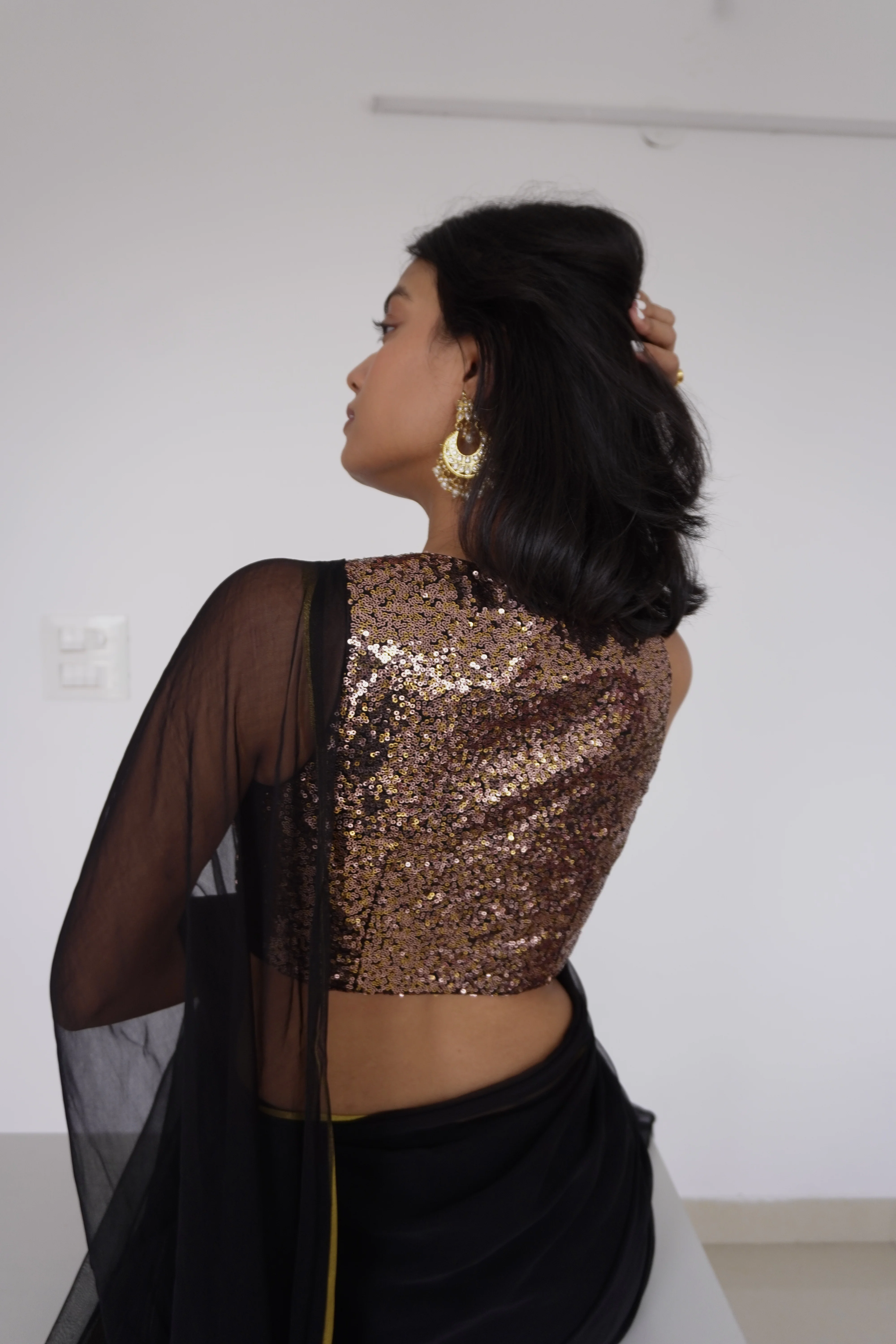 Lavanya x Tyohaar | Sleeveless Black & Gold Sequined Saree Blouse with Curved V-Neck - Image 17