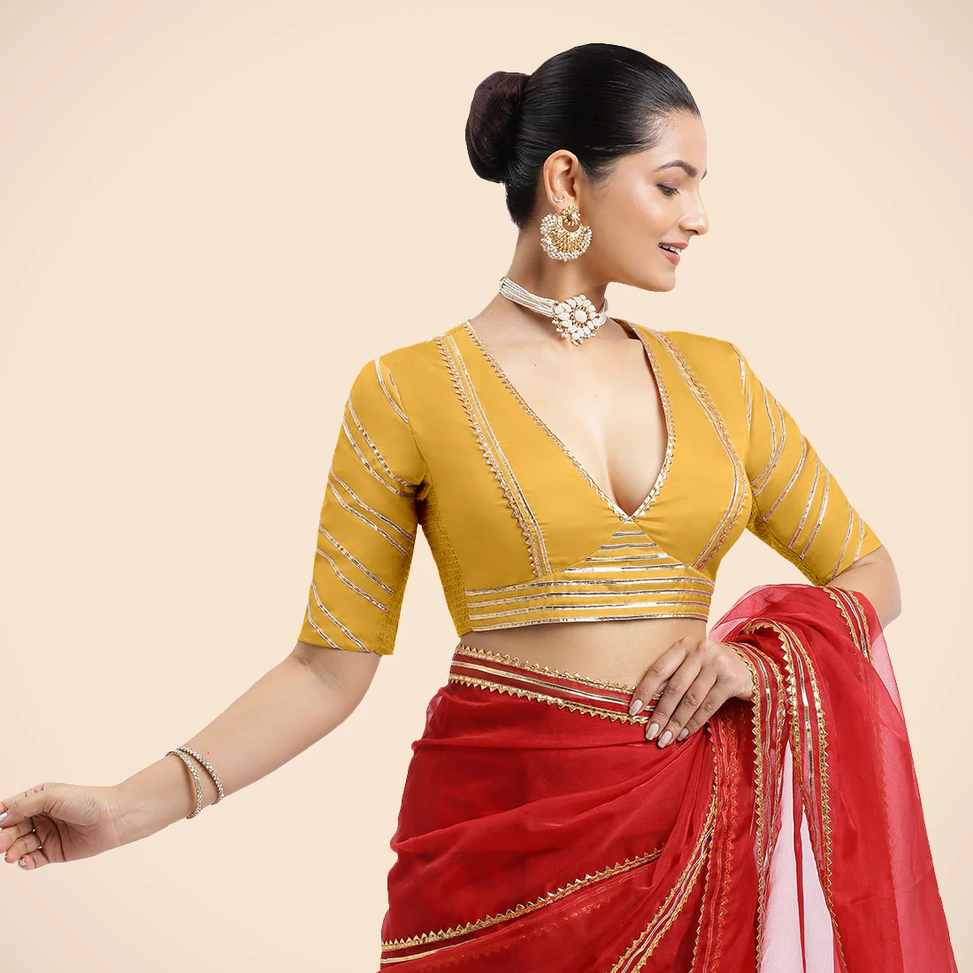 Navya x Tyohaar | Elbow Sleeves Marigold Yellow FlexiFit™ Gota Embellished Saree Blouse with Plunging V-Neck - Image 11