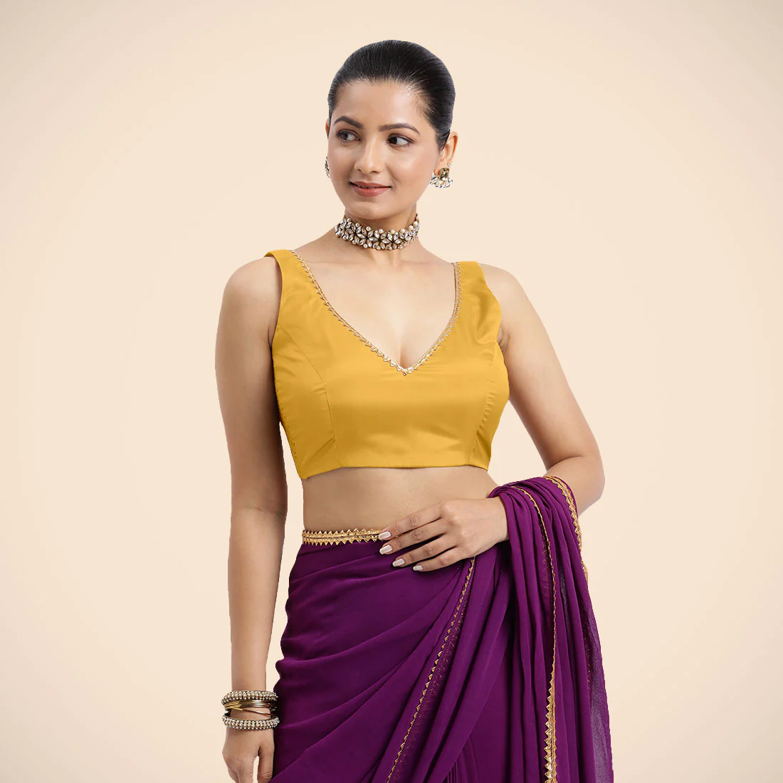 Raisa x Tyohaar | Sleeveless Marigold Yellow FlexiFit™ Gota Embellished Saree Blouse with Curved V-Neck